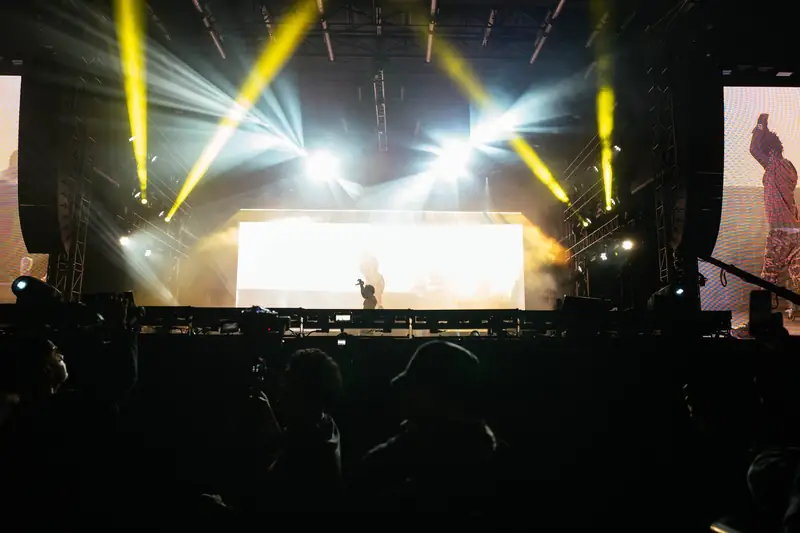 A festival crowd in front of the main stage at Don&rsquo;t Fall in Love Fest.